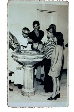 Durante seu batismo católico 