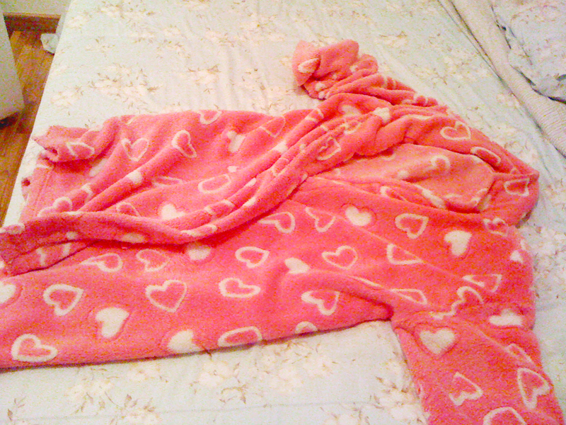 “Uso este roupão rosa de corações para dormir durante todo o inverno todo”
