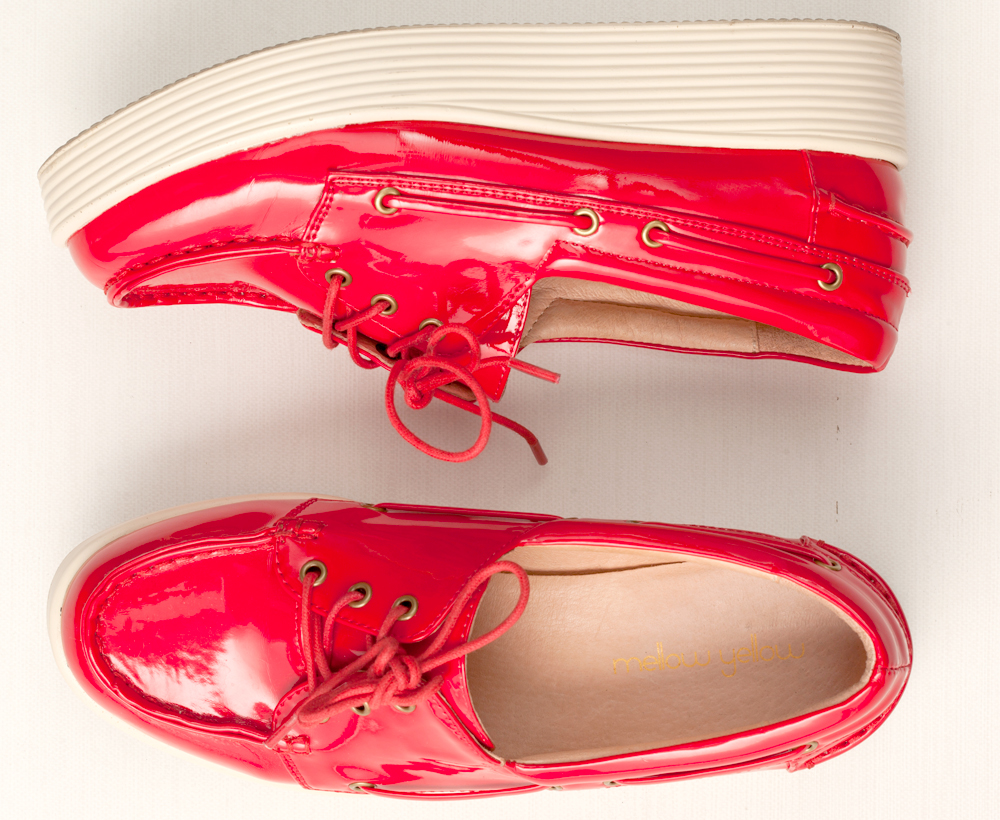 14. Sapato vermelho Queria um sapato alto vermelho que não machucasse o pé.