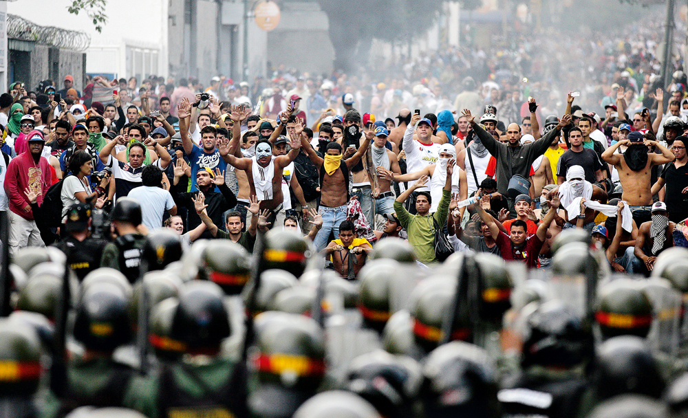 Manifestação na Venezuela, onde negociou com Hugo Chávez e a oposição