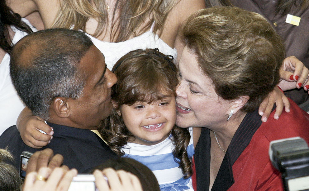 Com a filha, Ivy, e a presidente Dilma Rousseff