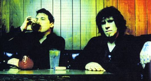 Com o Gutter Twins, ao lado de Greg Dulli